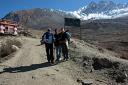 Drew, Mohan and Megan at the entrance to Muktinath