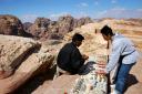 Bedouin salesman ruining the view at the top, Korean tourist encouraging him to do so