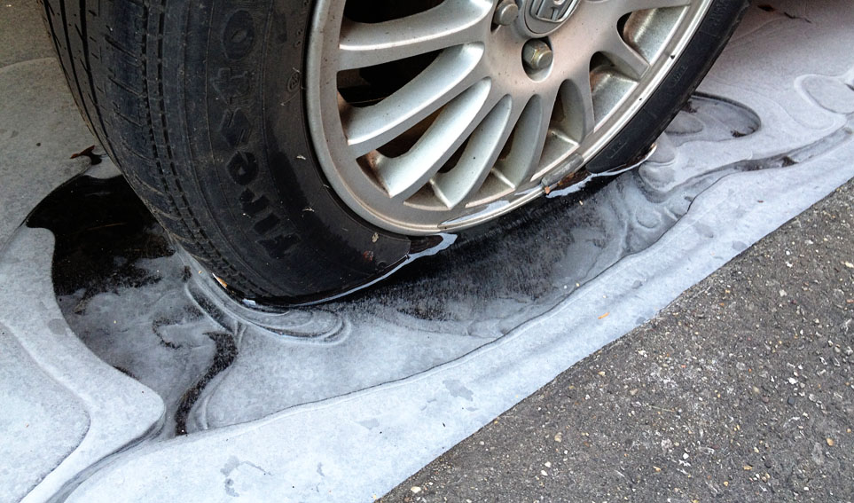 Hazards of parking in the gutter